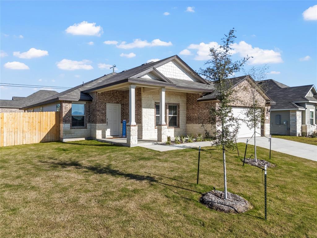 10761 Chesson Flts Drive Waco, TX 76708 - Photo 3 of 30 a view of a house with backyard and porch
