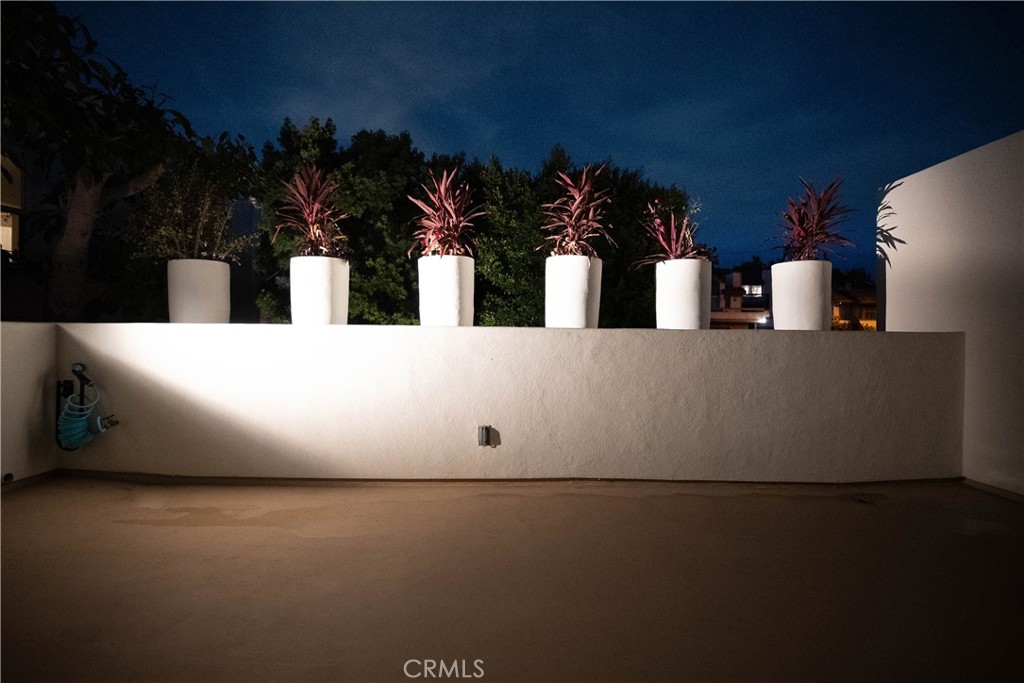 558 Cliff Drive Laguna Beach, CA 92651 - Photo 20 of 25 a view of a house with a floor to ceiling window