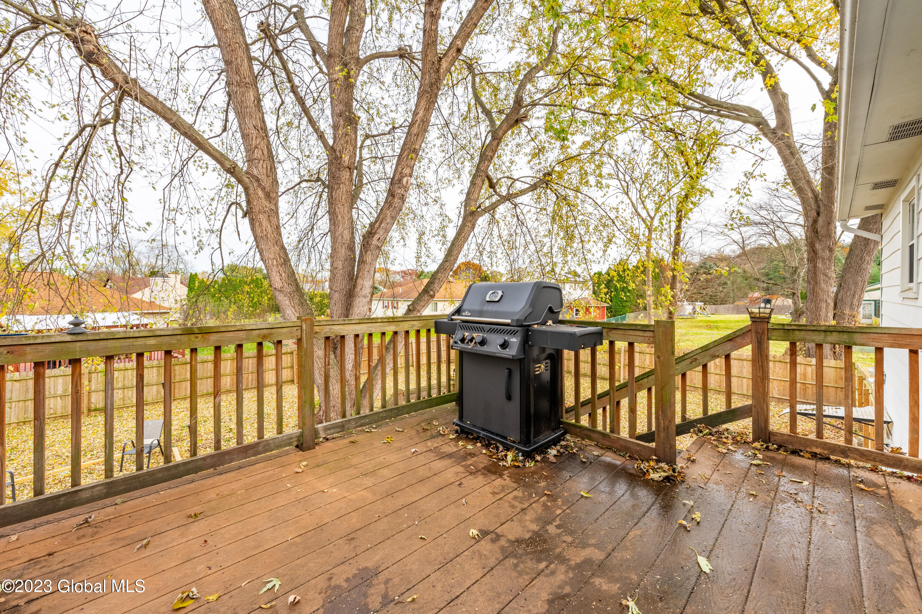 8 The Concourse Bethlehem, NY 12203 - Photo 12 of 25 Deck off Sun Room