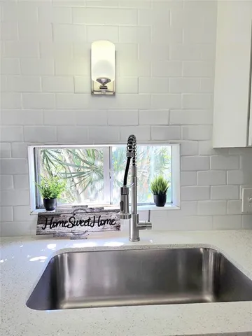 a view closeup a sink and a window