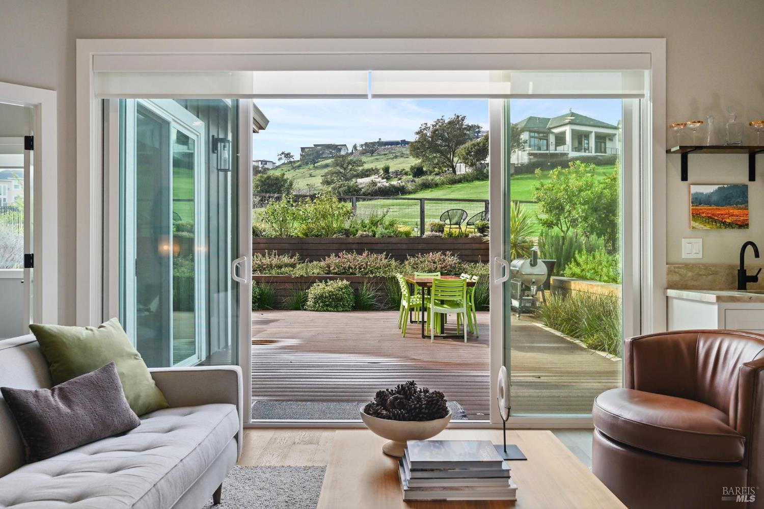 3761 Cross Creek Road Santa Rosa, CA 95403 - Photo 14 of 44 a living room with furniture and a floor to ceiling window