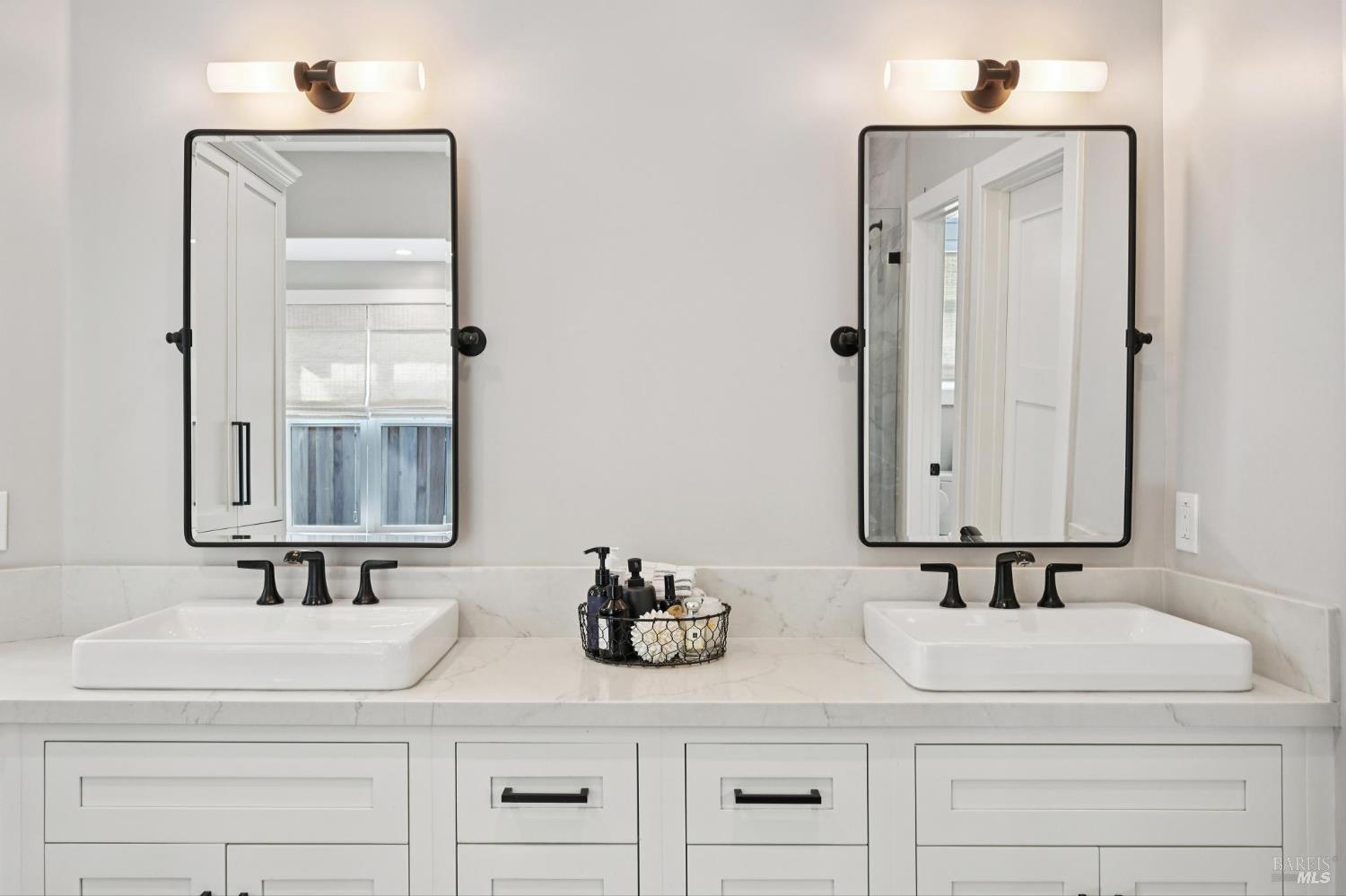 3761 Cross Creek Road Santa Rosa, CA 95403 - Photo 21 of 44 a bathroom with double vanity sink and two mirror