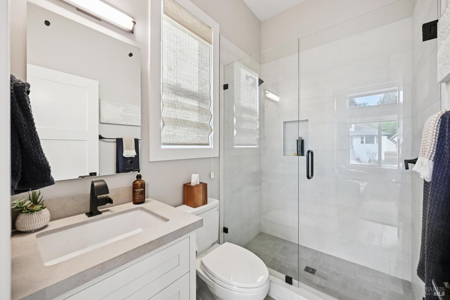 3761 Cross Creek Road Santa Rosa, CA 95403 - Photo 26 of 44 a bathroom with a sink toilet tub and shower