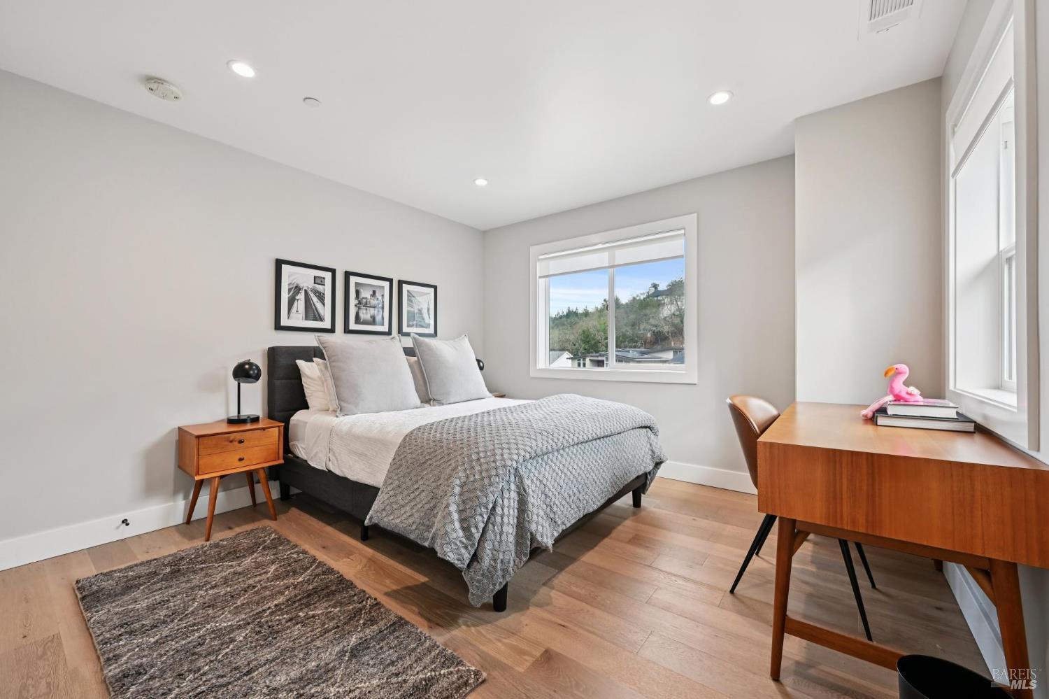 3761 Cross Creek Road Santa Rosa, CA 95403 - Photo 29 of 44 a bedroom with a bed and a window