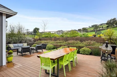 a view of a terrace with furniture and outdoor space