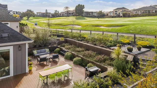 a view of a swimming pool with lounge chairs