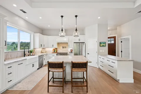 a large kitchen with lots of counter space and appliances