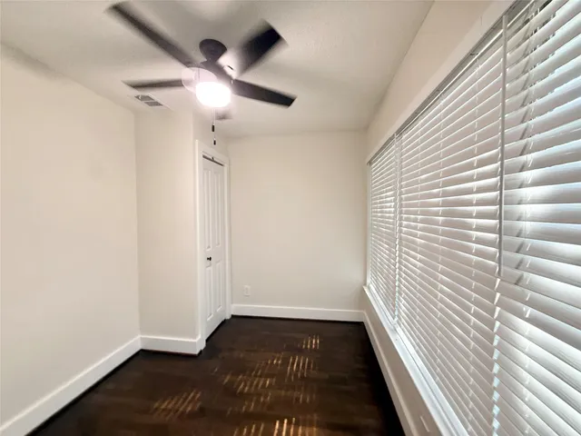 a view of gallery with wooden floor
