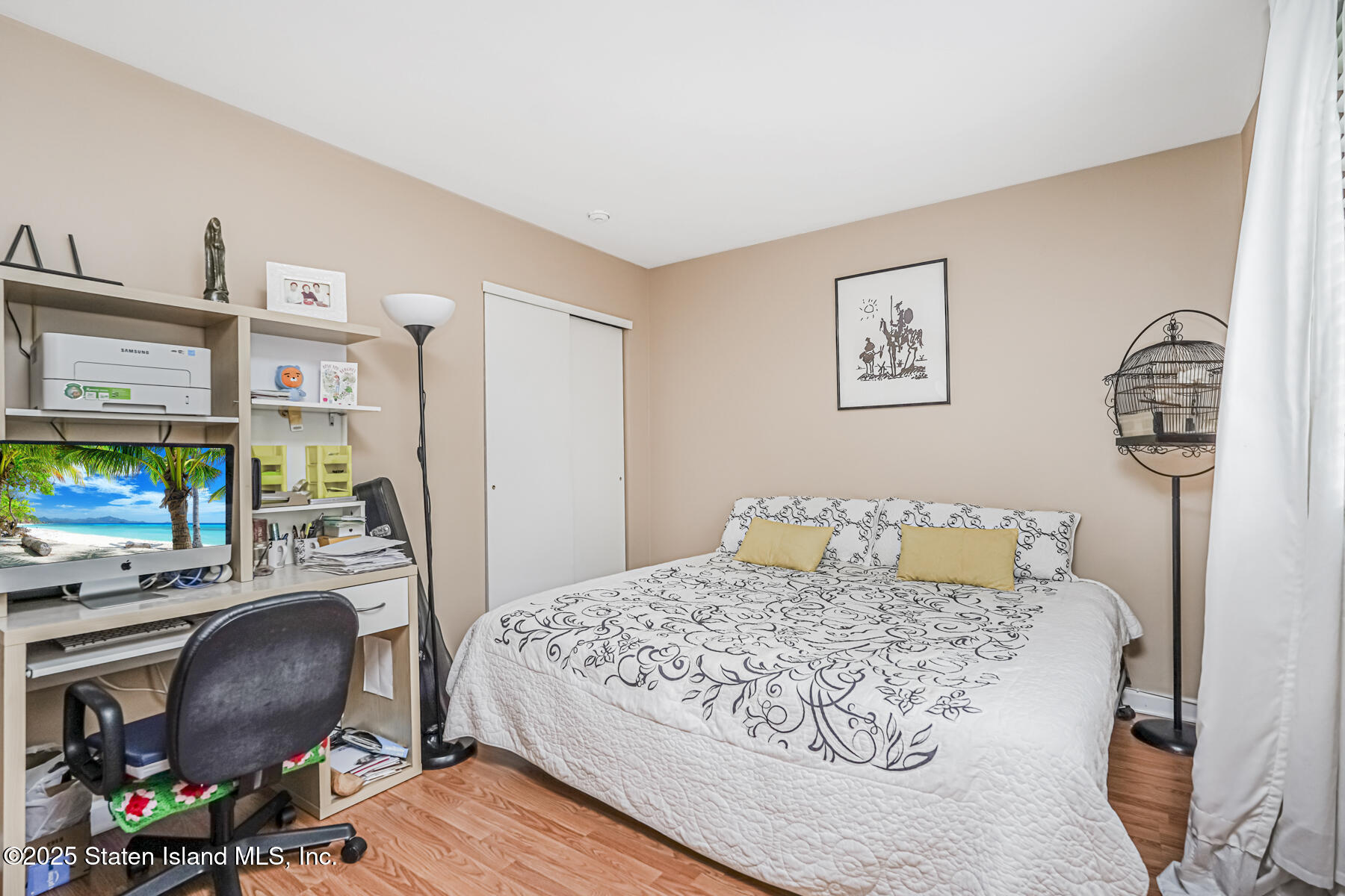 45 Sommer Avenue Staten Island, NY 10314 - Photo 15 of 31 a bedroom with a bed a computer on desk and a chair