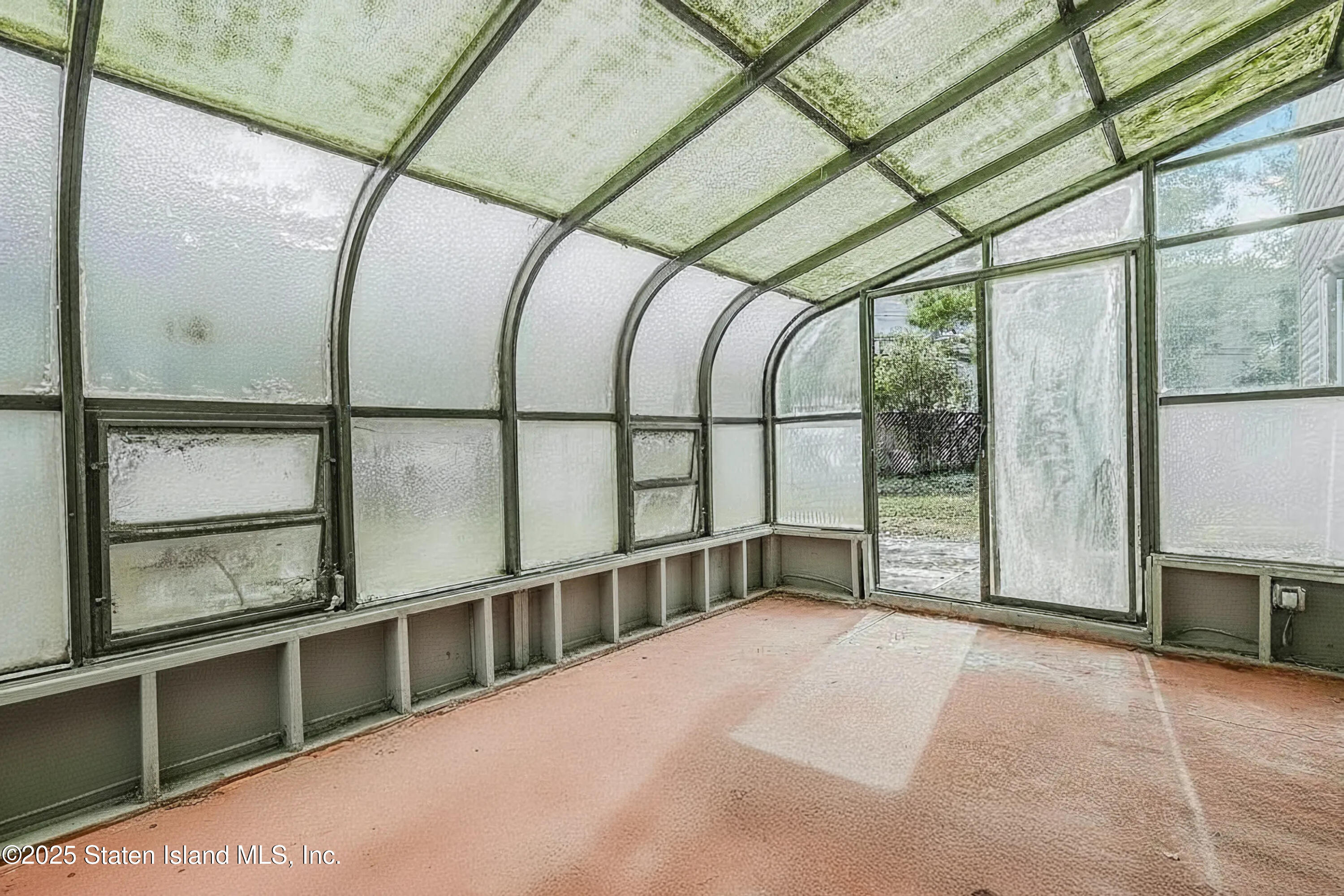 45 Sommer Avenue Staten Island, NY 10314 - Photo 27 of 31 a view of an empty room with a window