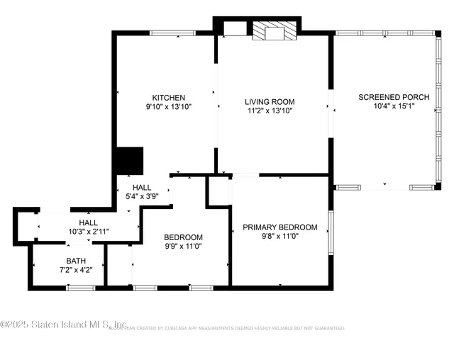 a picture of a bench in front of a wall