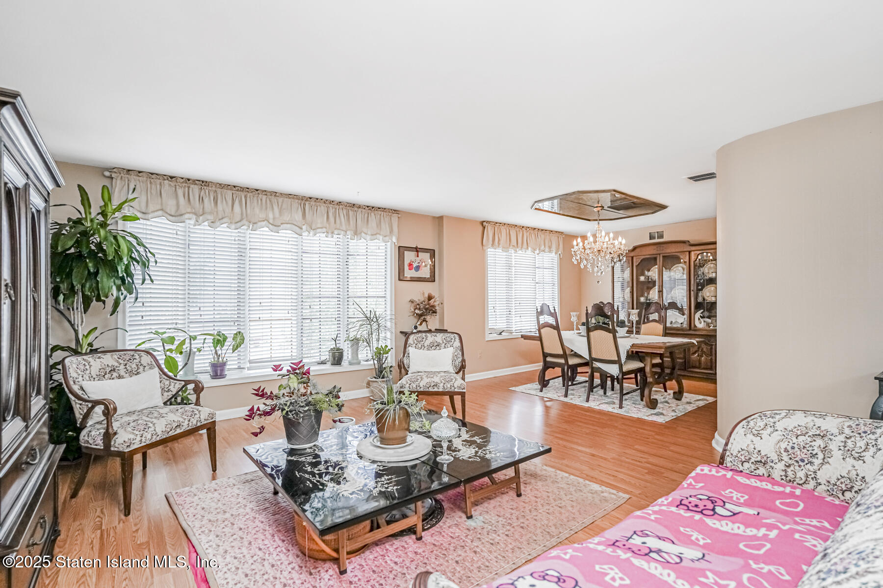 45 Sommer Avenue Staten Island, NY 10314 - Photo 5 of 31 a living room with furniture and a large window