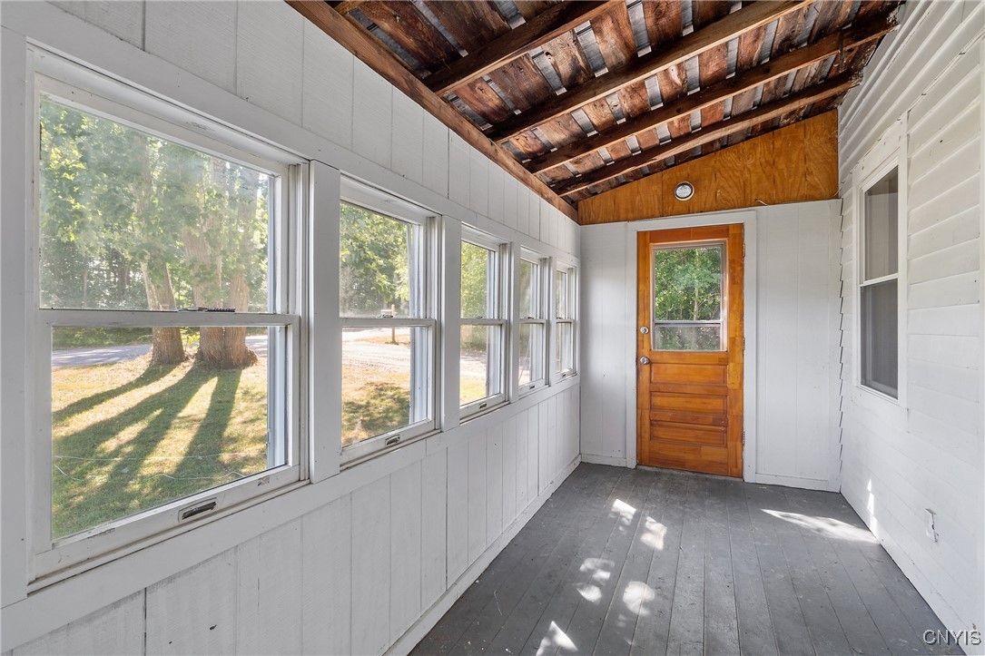 36 Bert Howard Road Hastings, NY 13036 - Photo 3 of 26 The enclosed porch has windows across the front an