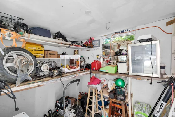 a storage room with washer and dryer