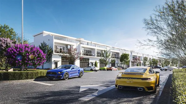 a view of a cars park in front of building