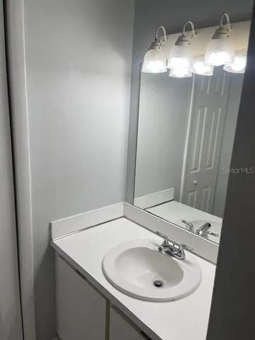 a view of an empty room and window in a room