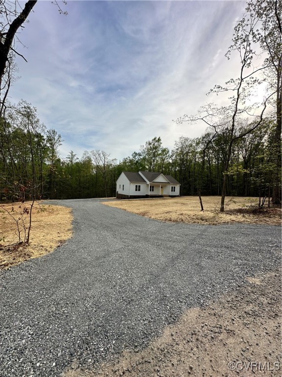 4632 Shannon Road Kents Store, VA 23084 - Photo 29 of 30 a view of a backyard with large trees