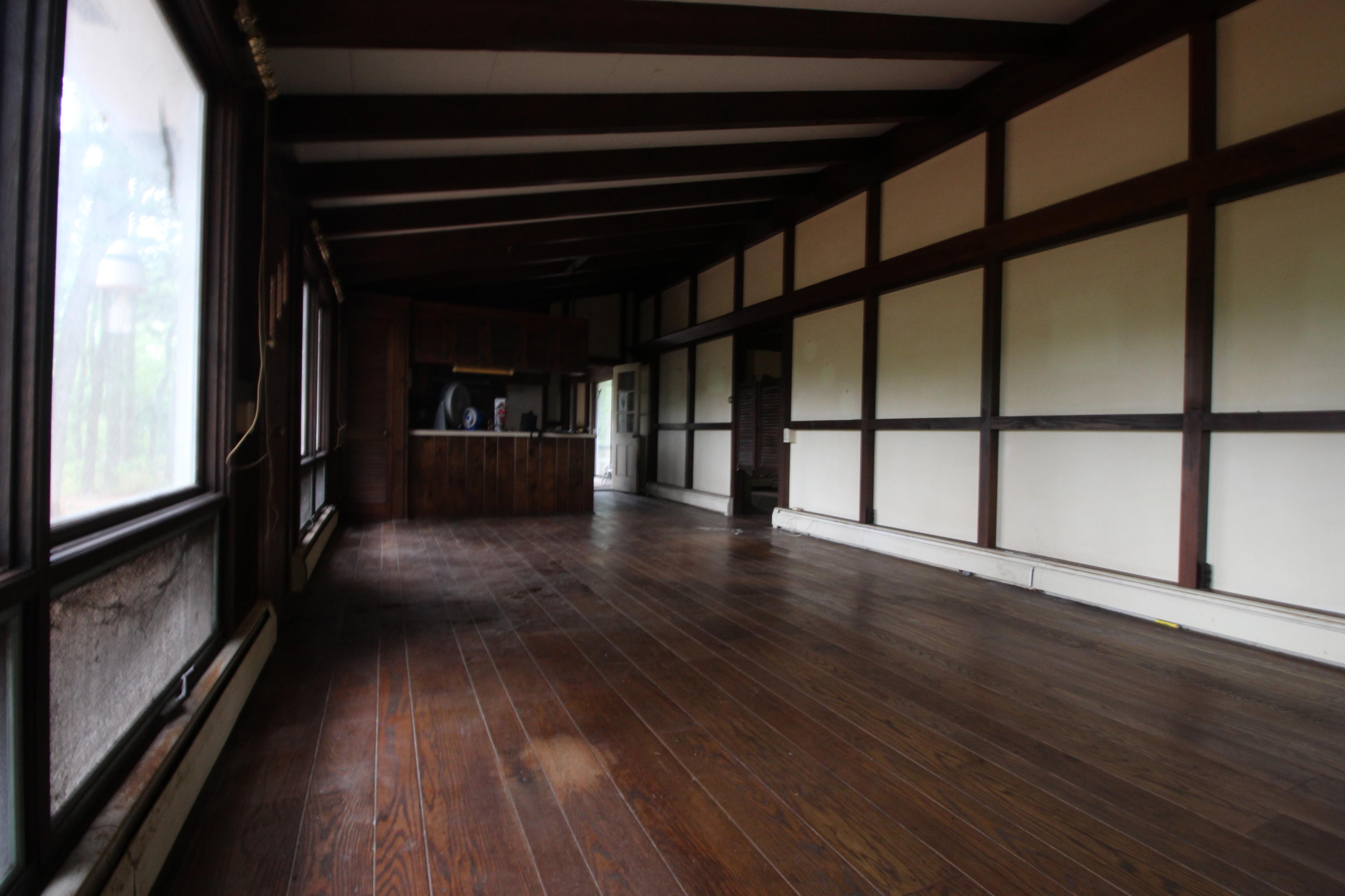 665 Governor Prence Road Eastham, MA 02642 - Photo 12 of 17 a view of gallery with wooden floor