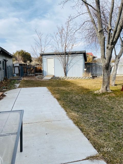 562 Spring Valley Parkway Spring Creek, NV 89815 - Photo 11 of 29 a view of back yard of the house
