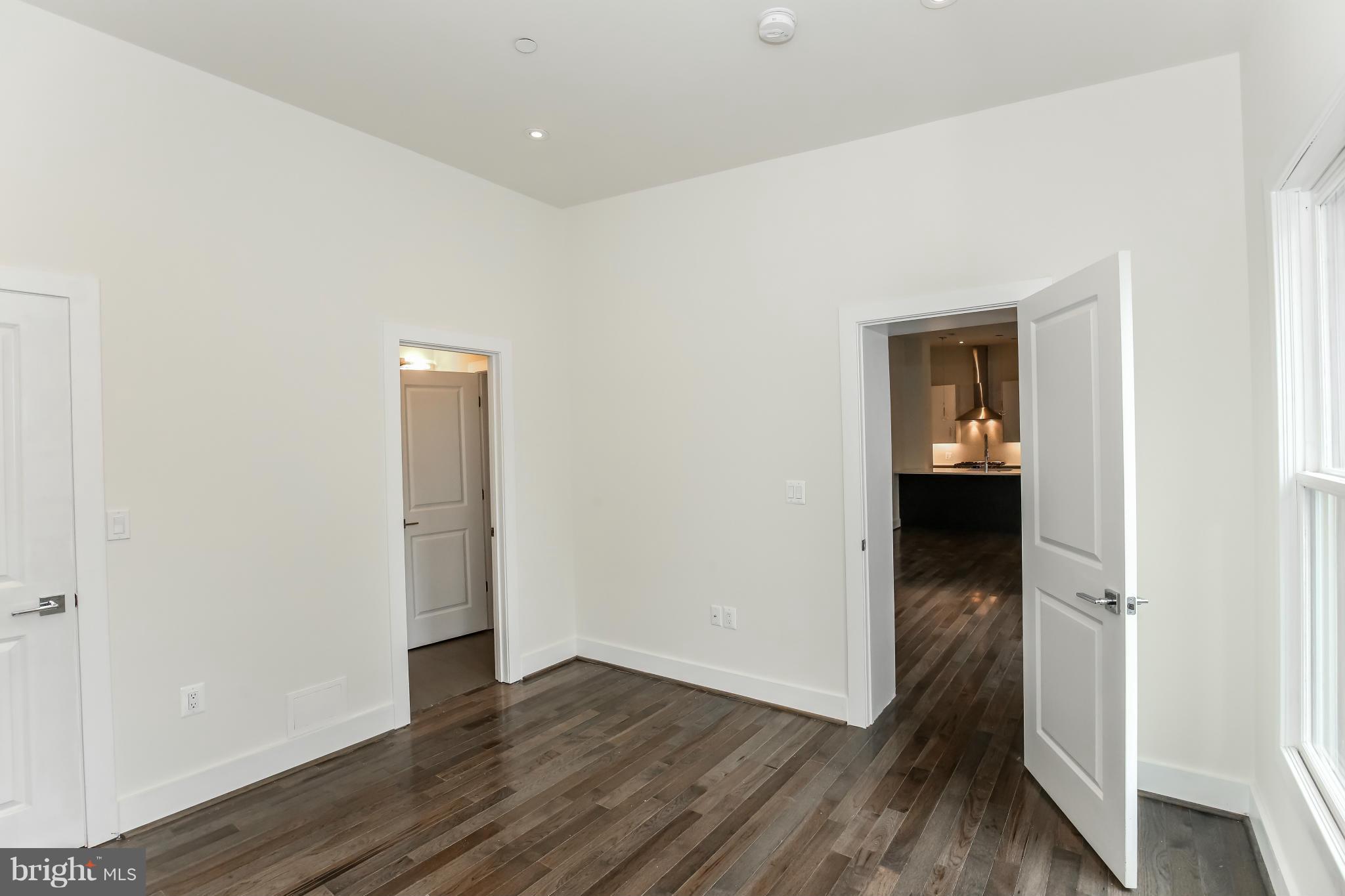 462 Ridge Street Northwest, Unit 3 Washington, DC 20001 - Photo 9 of 20 wooden floor in an empty room