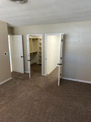 an empty room with closet