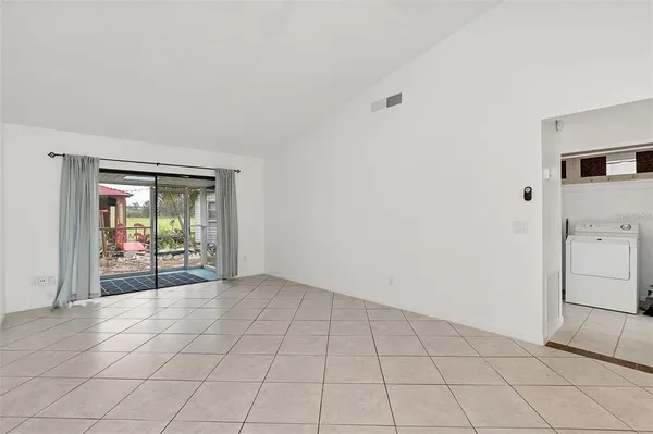 a view of an empty room with window