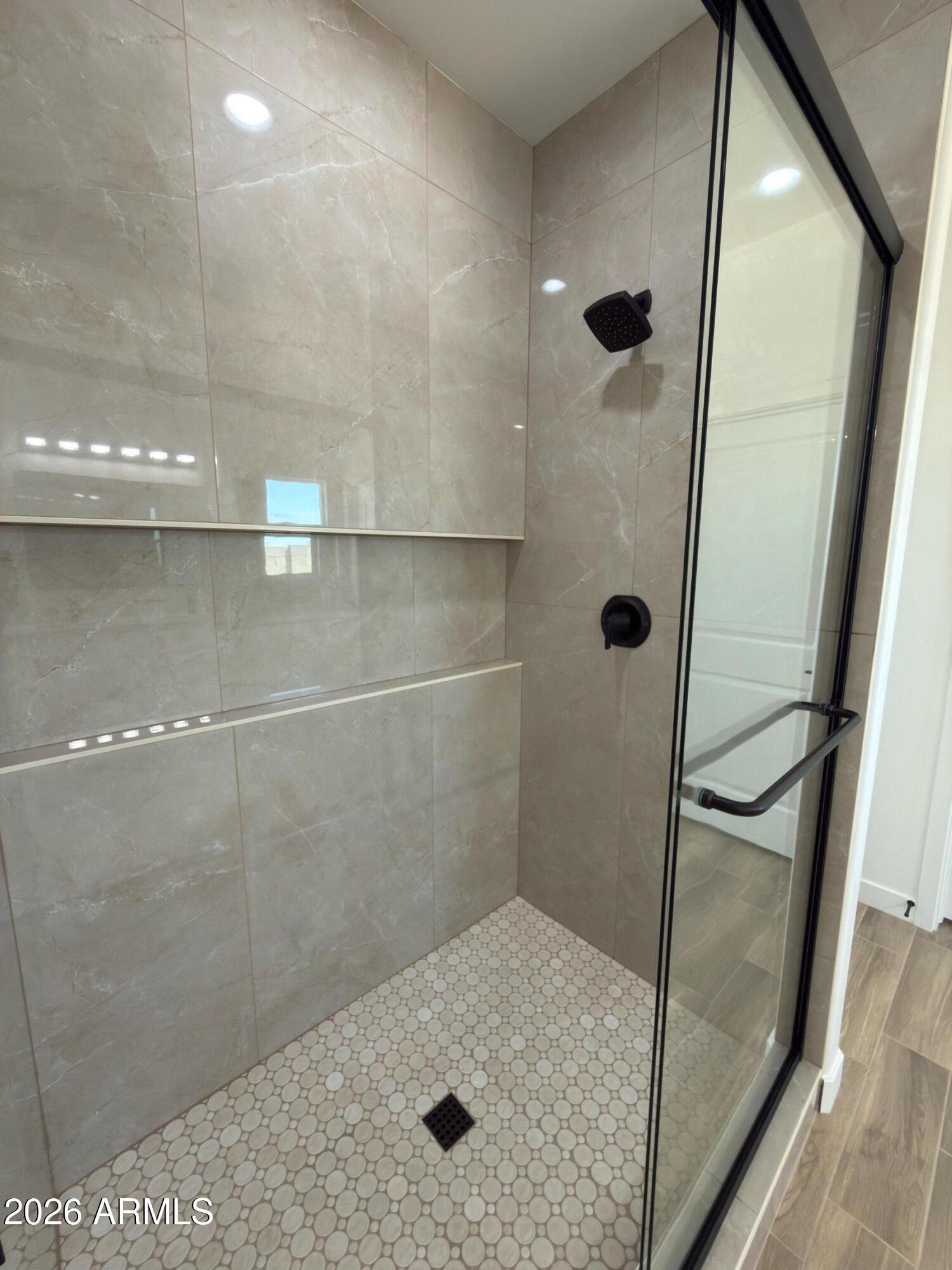 14199 South Diablo Road Arizona City, AZ 85123 - Photo 15 of 18 a bathroom with a shower