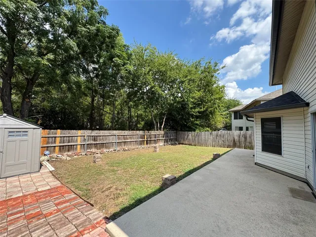 a view of a swimming pool with an outdoor space
