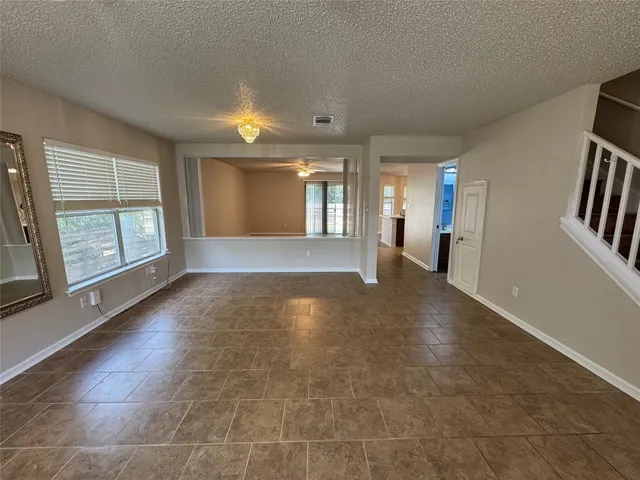 a view of livingroom with hardwood floor and hallway