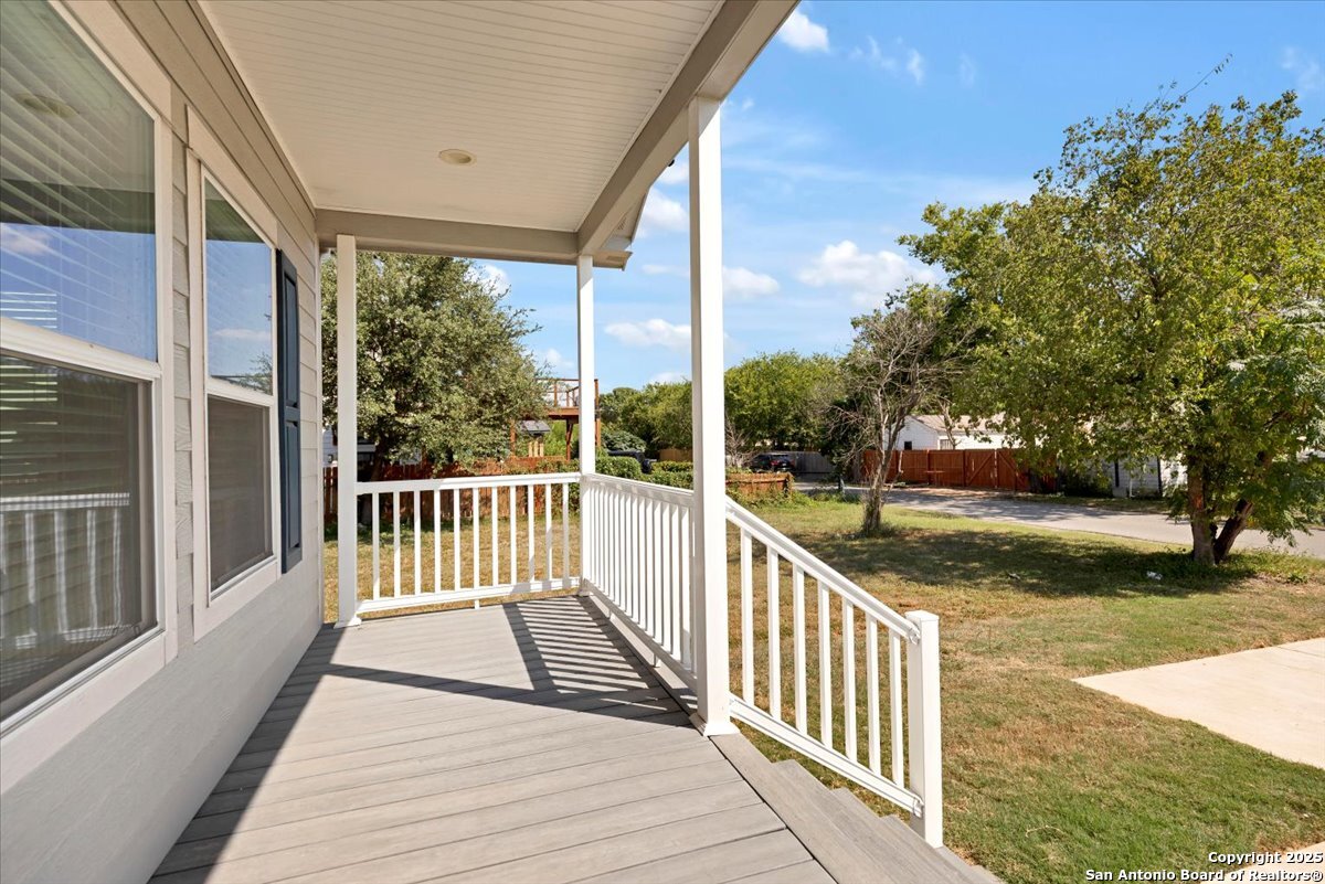 611 Rudolph San Antonio, TX 78202 - Photo 24 of 25 a view of a porch with wooden floor and fence