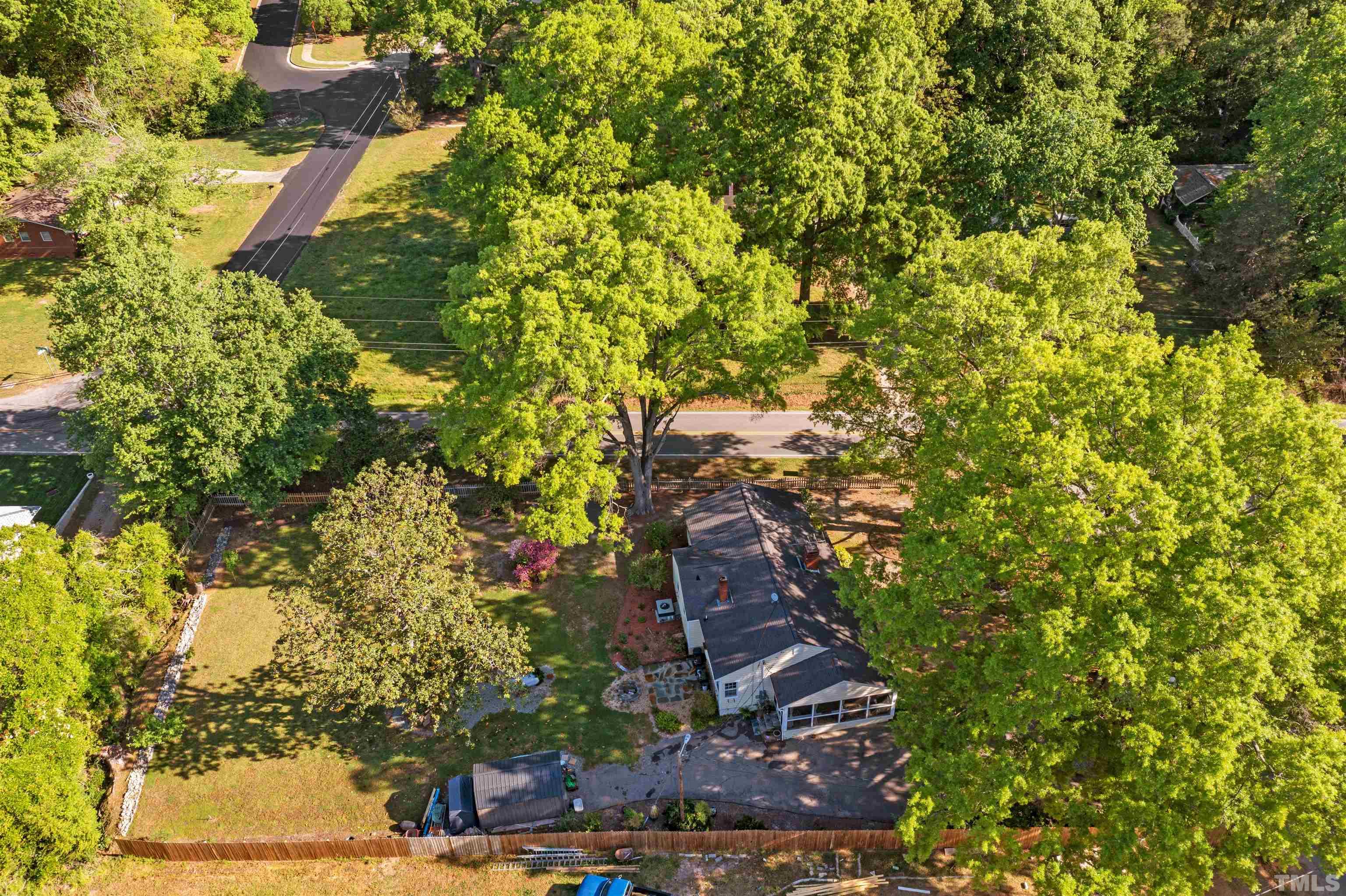 5100 Clearview Street Raleigh, NC 27603 - Photo 18 of 36 a view of a yard with plants