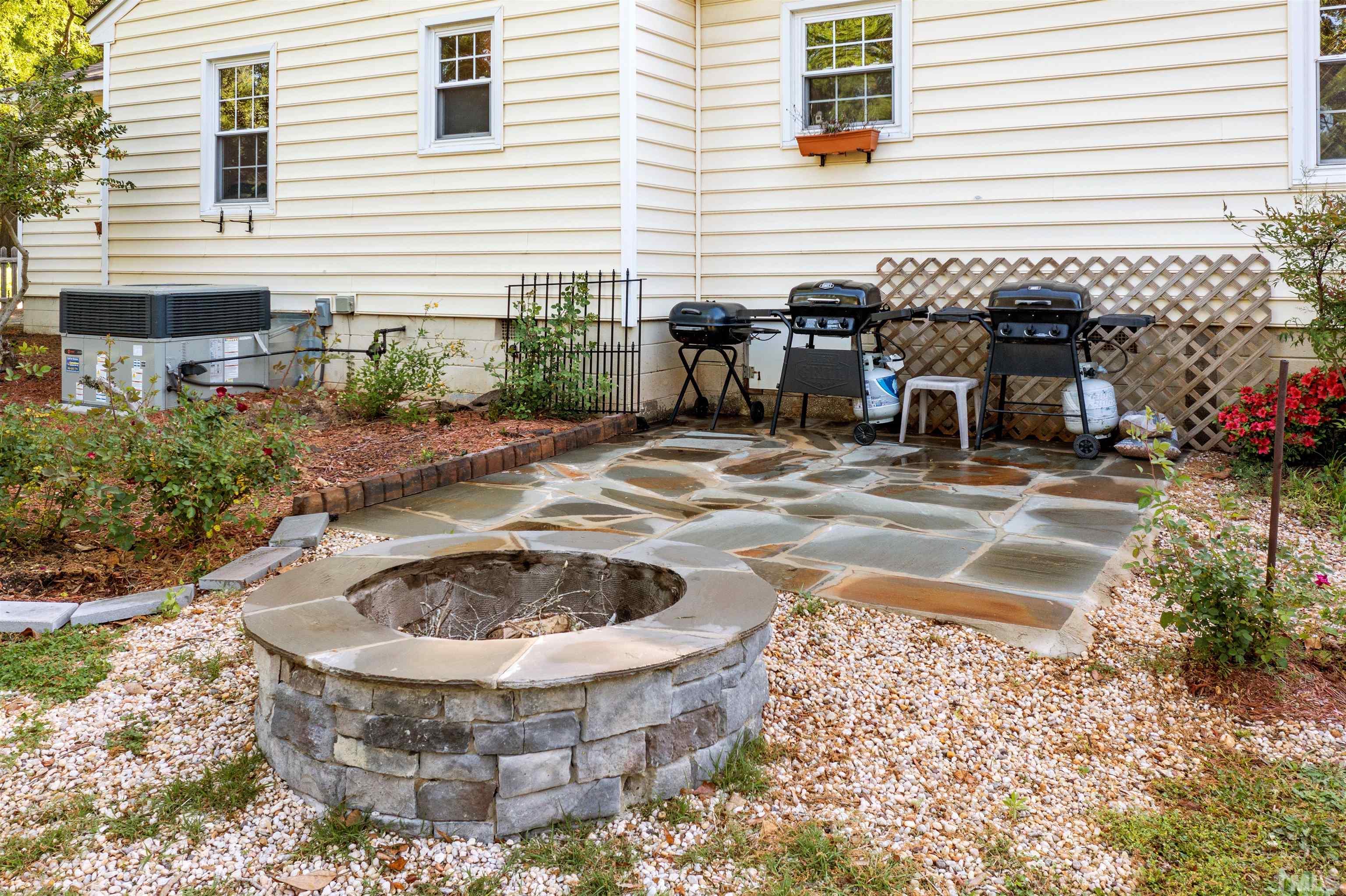 5100 Clearview Street Raleigh, NC 27603 - Photo 20 of 36 a view of fountain in front of a house