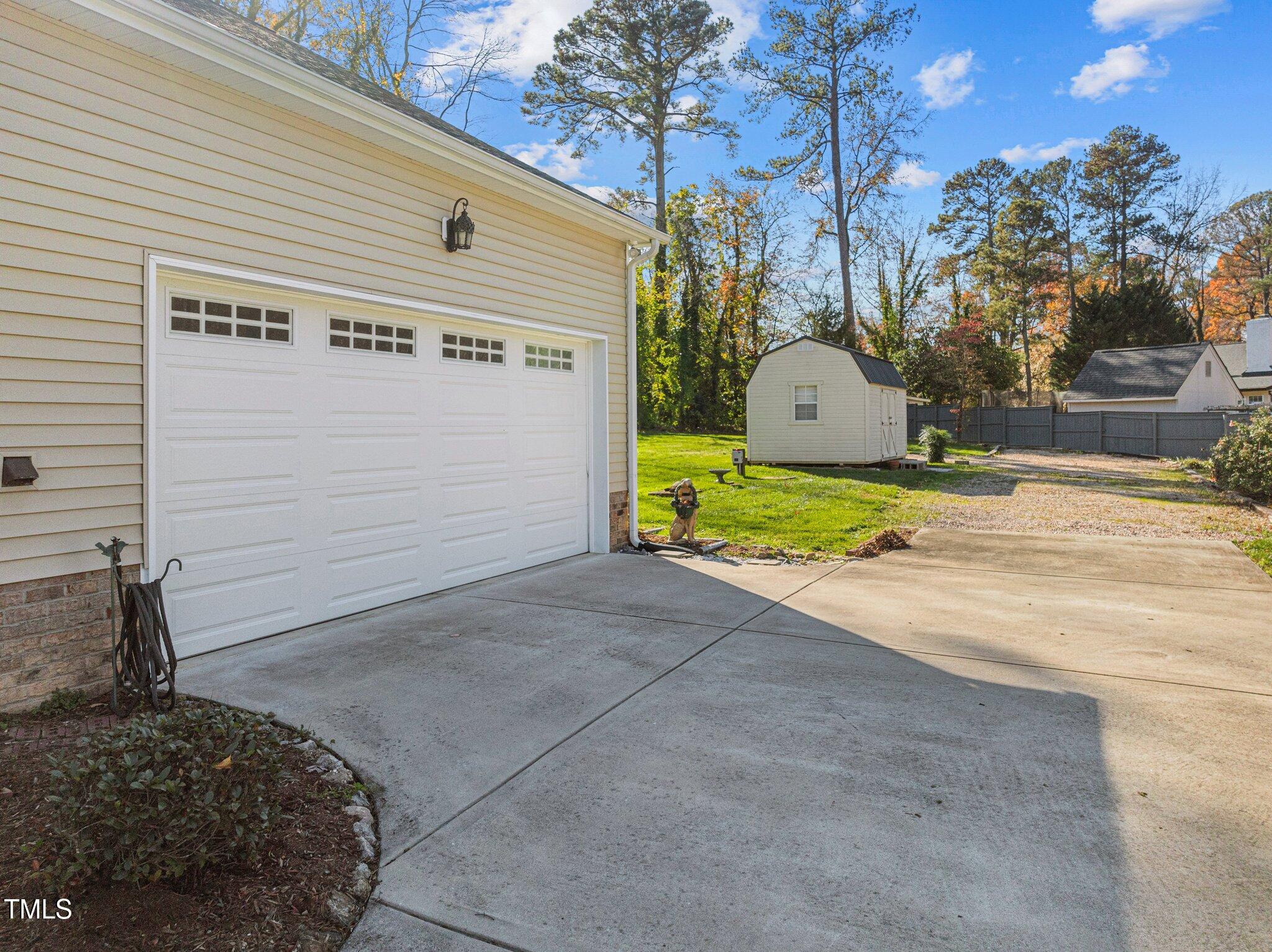 5012 Old Elizabeth Road Raleigh, NC 27616 - Photo 32 of 36 5012 Old Elizabeth side load garage and