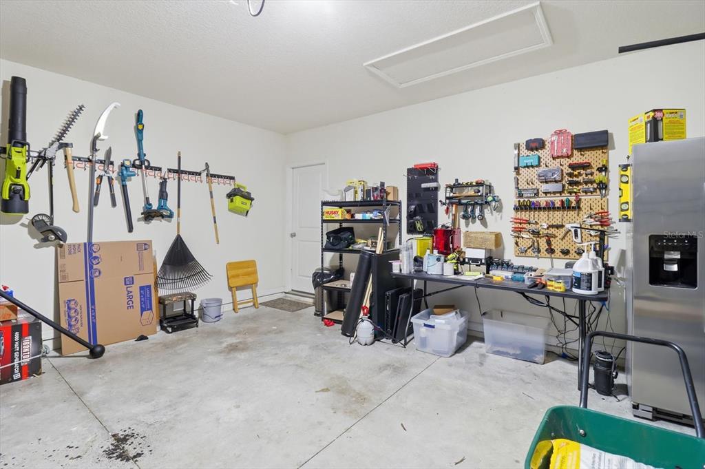 660 Hickory Course Loop Ocala, FL 34472 - Photo 35 of 45 a view of a room with gym equipment
