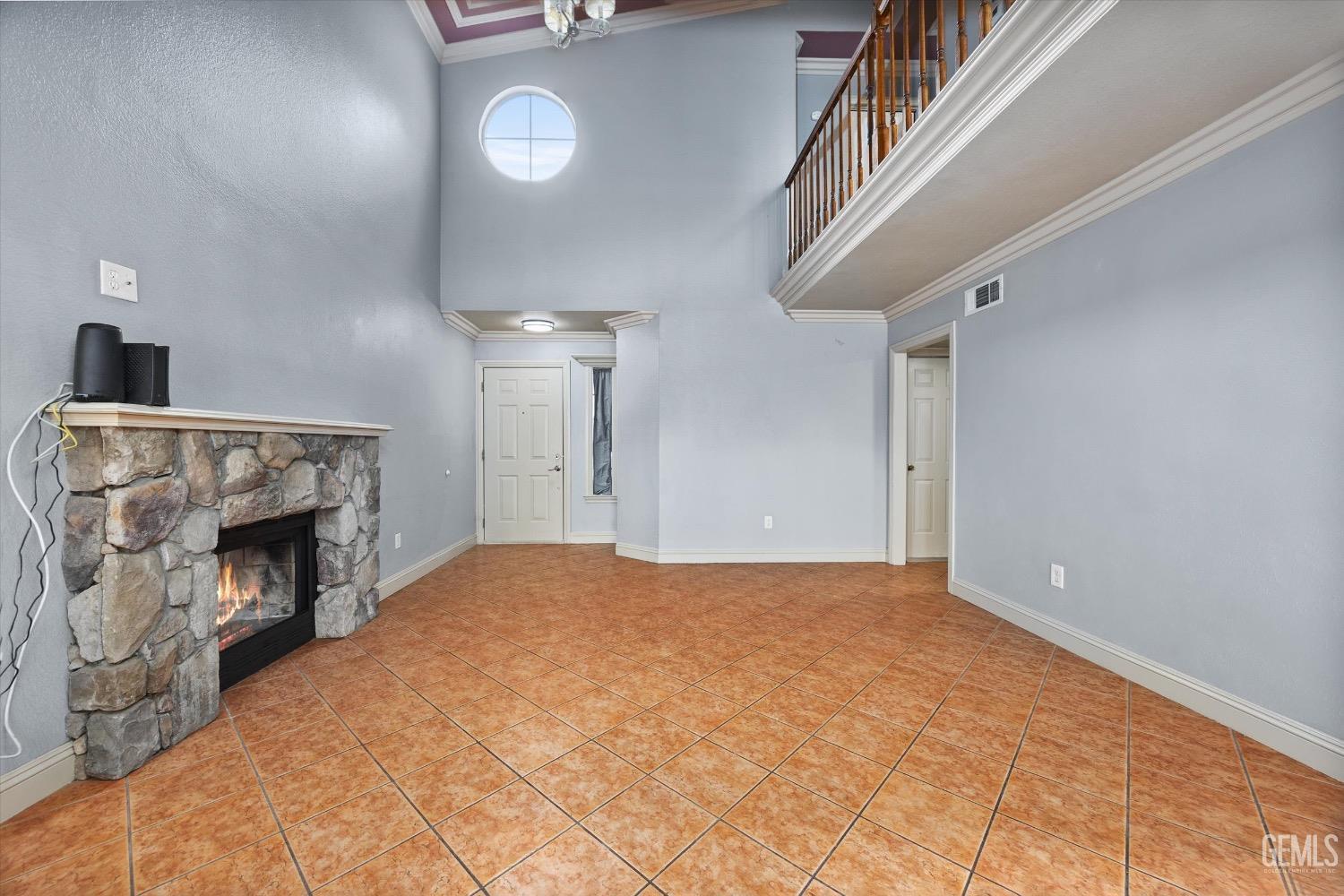 Undisclosed Address Bakersfield, CA 93307 - Photo 14 of 47 a view of an empty room and fire place