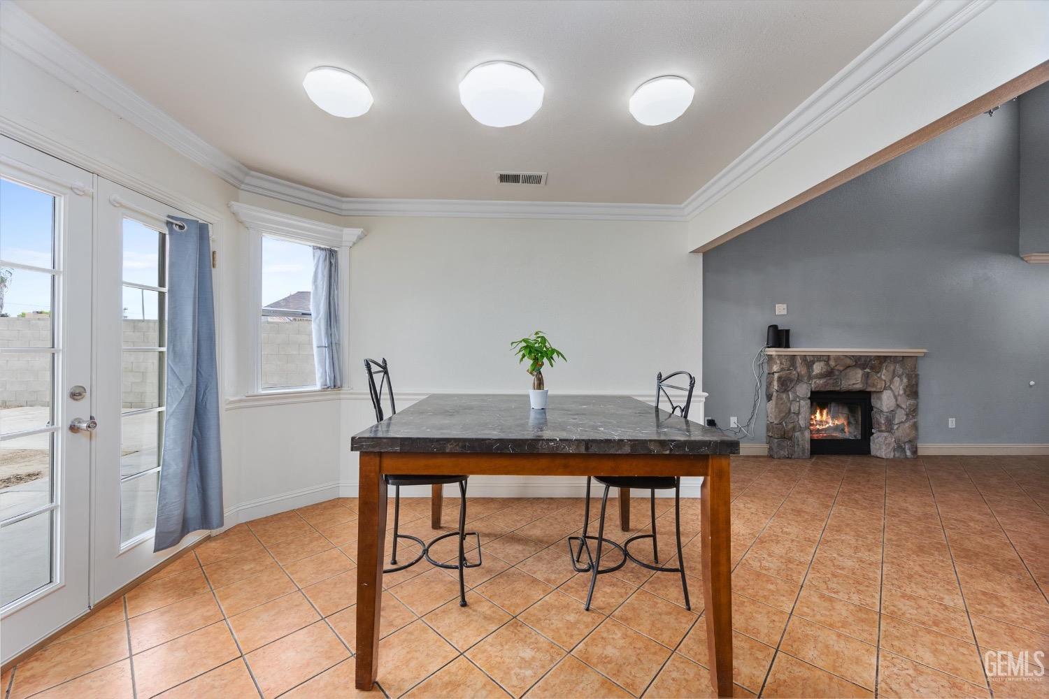 Undisclosed Address Bakersfield, CA 93307 - Photo 16 of 47 a workspace with furniture