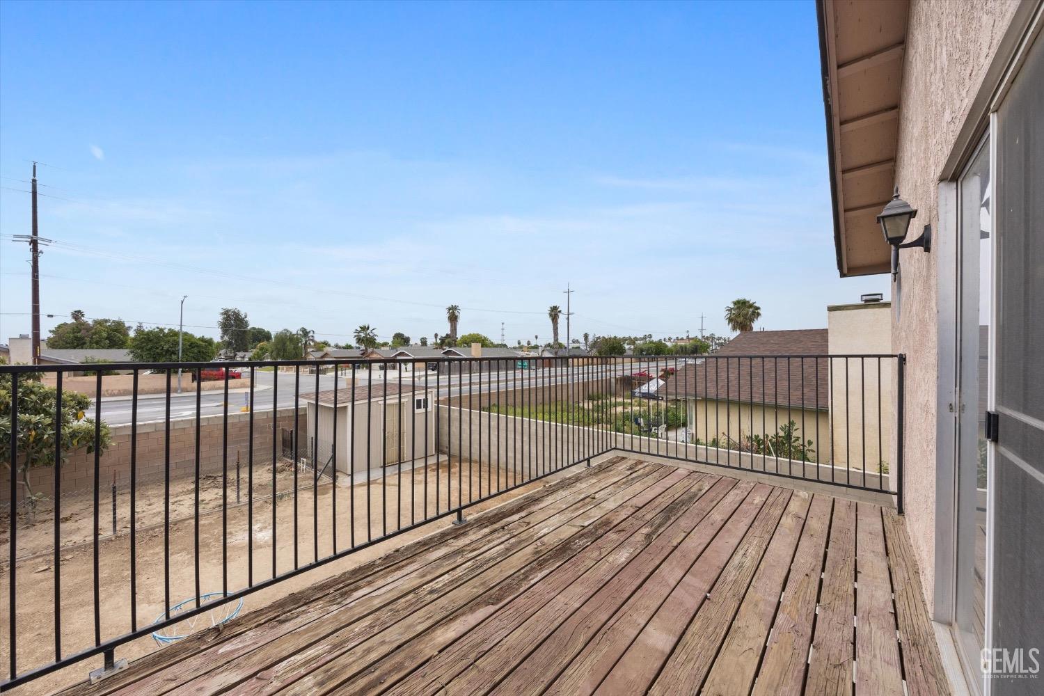 Undisclosed Address Bakersfield, CA 93307 - Photo 22 of 47 a view of balcony with wooden floor