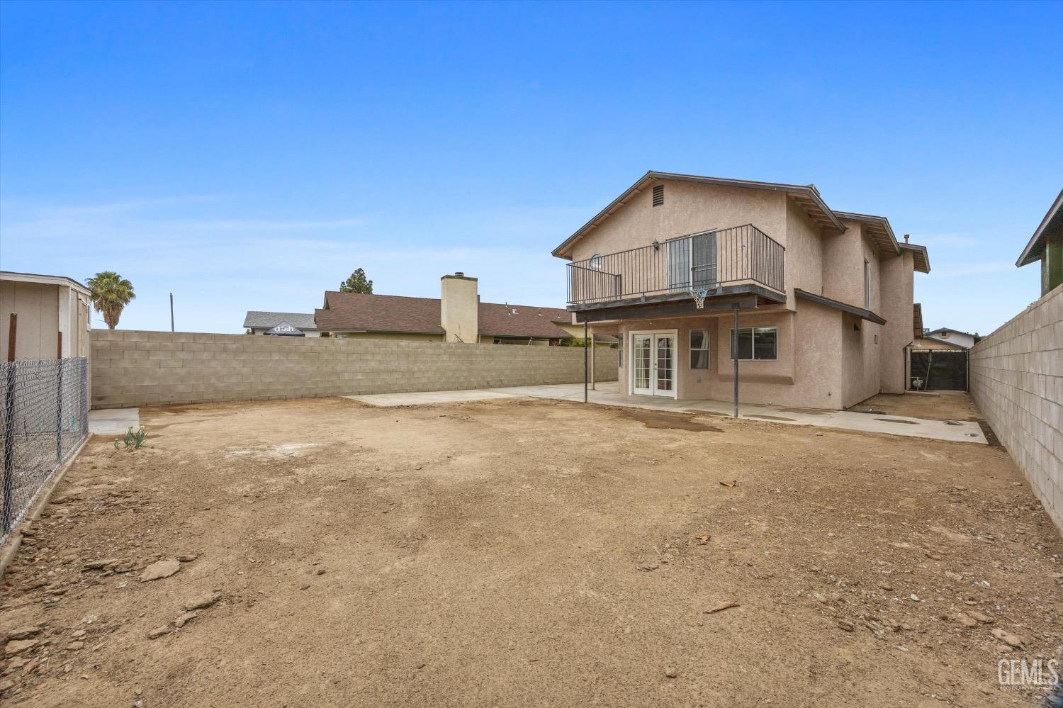 Undisclosed Address Bakersfield, CA 93307 - Photo 38 of 47 a view of a house with a outdoor space