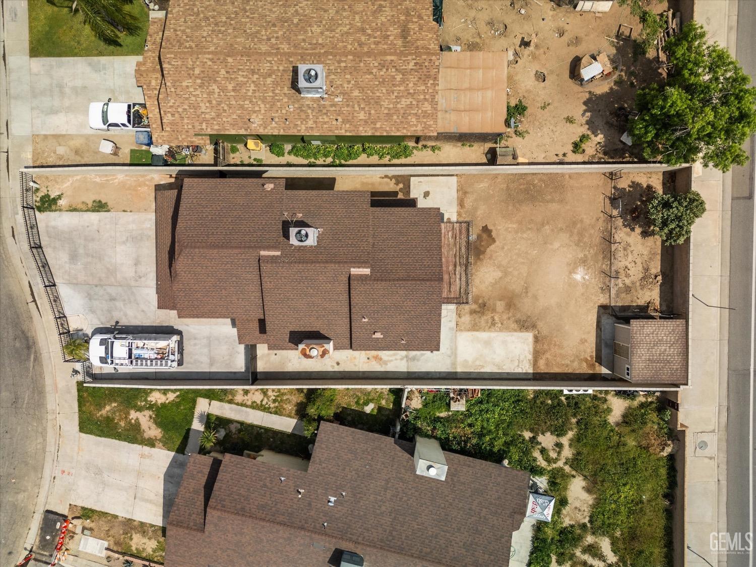 Undisclosed Address Bakersfield, CA 93307 - Photo 46 of 47 an aerial view of residential houses with outdoor space