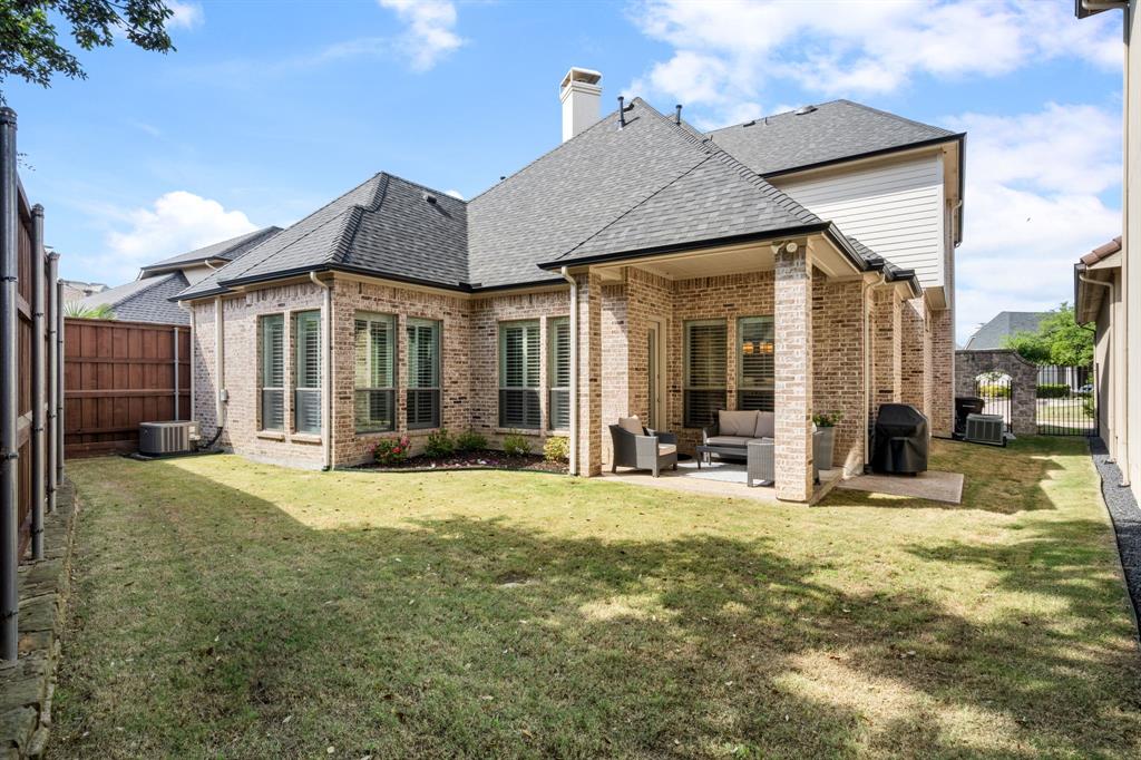 5116 Meadowside Lane Plano, TX 75093 - Photo 2 of 36 a view of a house with backyard porch and sitting area