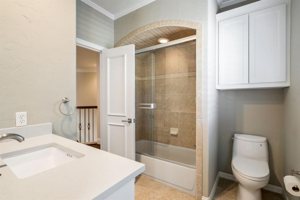 5116 Meadowside Lane Plano, TX 75093 - Photo 23 of 36 a bathroom with a sink toilet and shower