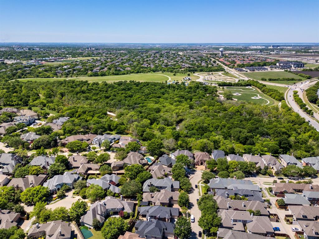 5116 Meadowside Lane Plano, TX 75093 - Photo 29 of 36 an aerial view of a city with lots of residential buildings