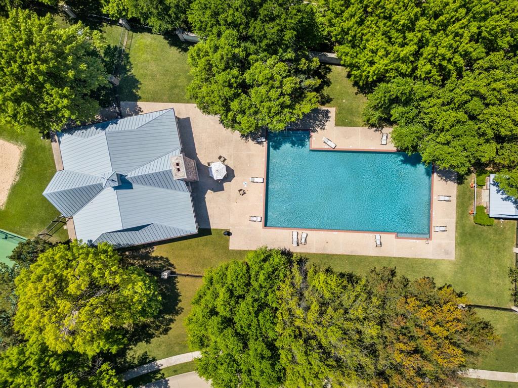5116 Meadowside Lane Plano, TX 75093 - Photo 34 of 36 an aerial view of a house with a yard and lake view