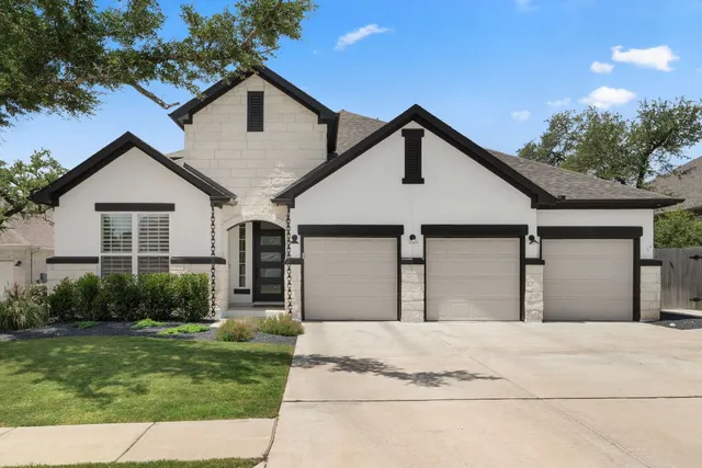 a house view with a garden space