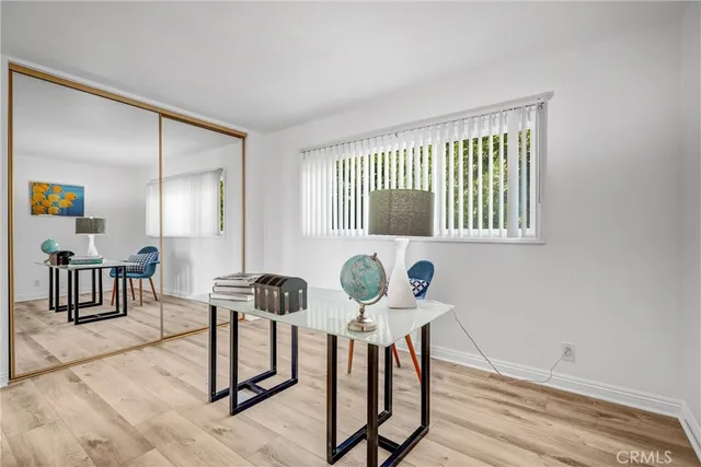 a view of a livingroom with furniture and windows