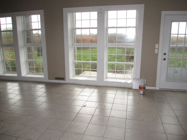 1953 Twist Road Franklin Grove, IL 61031 - Photo 11 of 16 a view of a room with tiles and windows