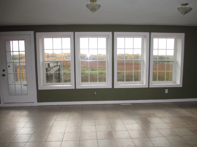 1953 Twist Road Franklin Grove, IL 61031 - Photo 2 of 16 a view of room with window and hardwood