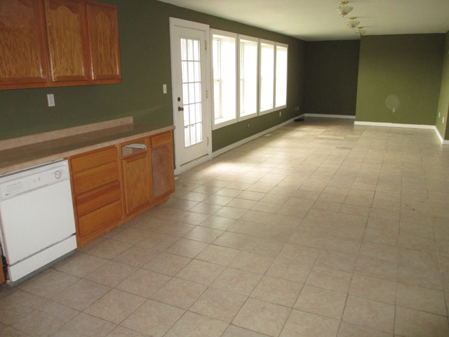 1953 Twist Road Franklin Grove, IL 61031 - Photo 3 of 16 a view of an empty room with a window