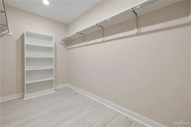 a view of an empty walk in closet