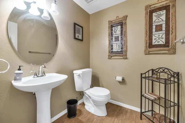 a view of entryway with stairs and wooden floor